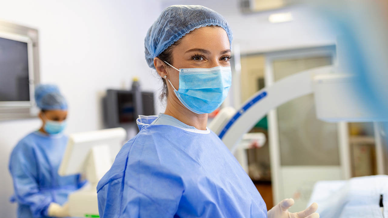 Female surgeon ready to perform surgery