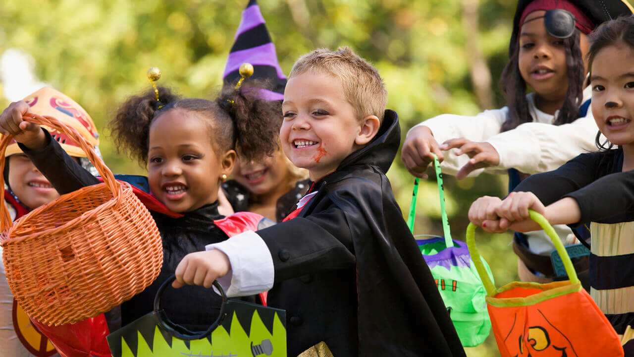 Children dressed in costumes Trick or Treating