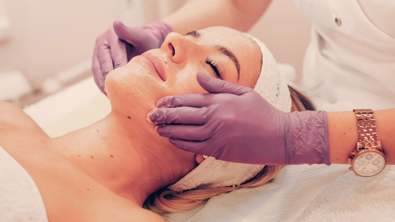 woman receiving a chemical peel