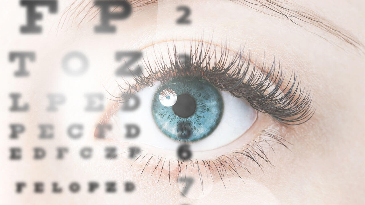 eye looking through eye chart