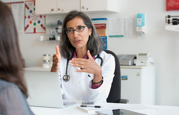female physician explaining procedure