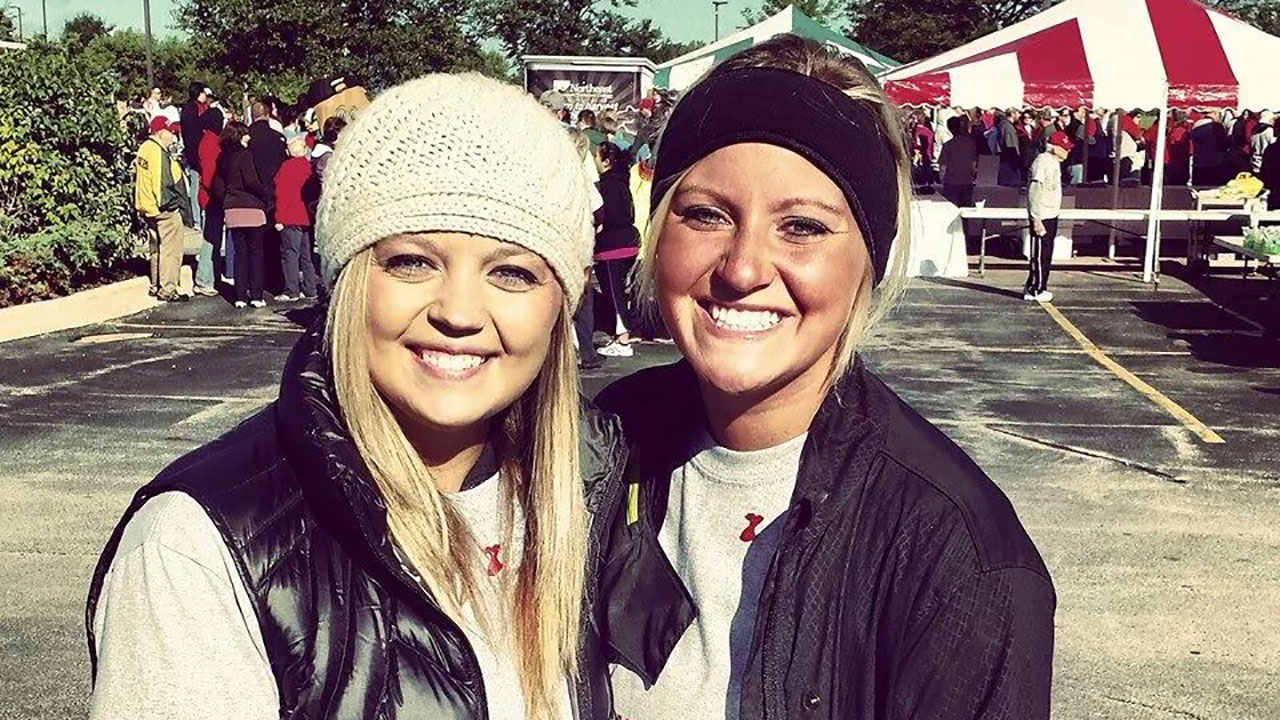 Kinnard sisters standing outside at a sports rally